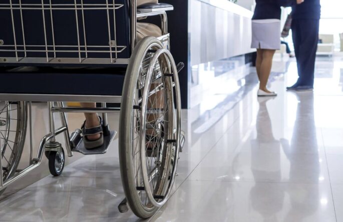 Closeup of a wheelchair in a nursing home setting