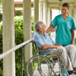 2 senior citizens at nursing home with nurse