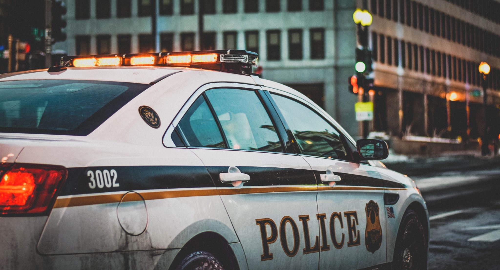 a police car outside of a building