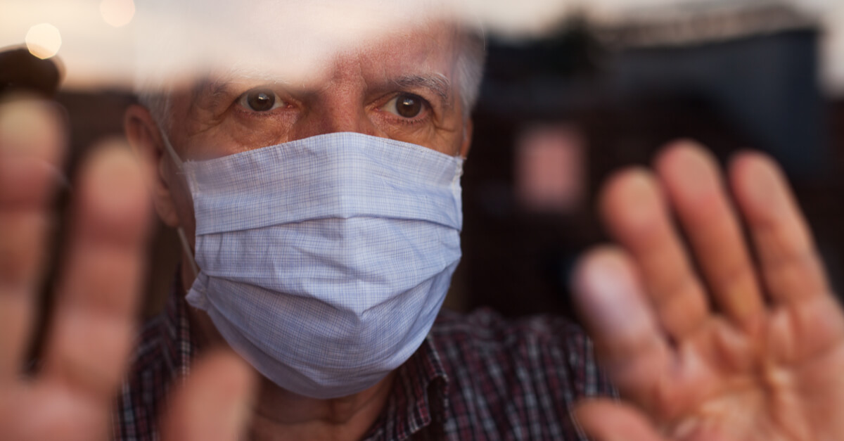 a man in a nursing home with a facemask