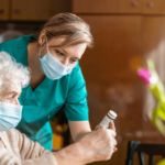 Nurse helping elderly women